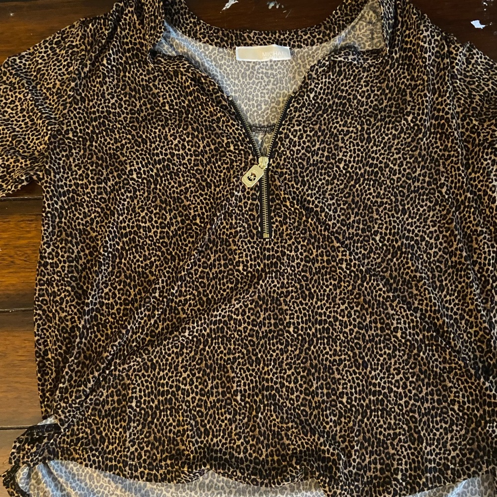 Leopard print MK 1/4 zip up shirt and it had 3/4 sleeves never worn (tried on)